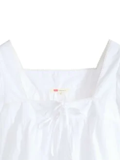 Chemisier en coton blanc uni avec une coupe droite et un col carré