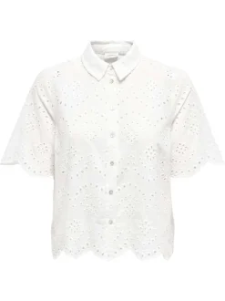 Chemisier en coton blanc uni avec une coupe droite et un col à revers