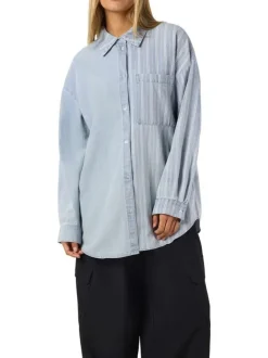 Chemisier en coton bleu uni avec une coupe droite et un col chemise