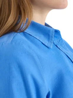 Chemisier en coton bleu uni pourvu d'une coupe droite et d'un col français