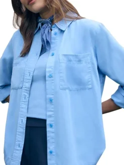Chemisier en coton bleu uni pourvu d'une coupe droite et d'un col français
