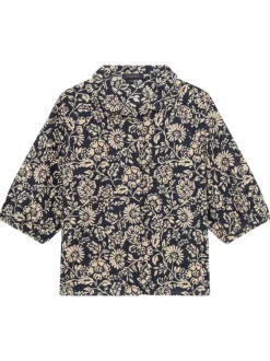 Chemisier en coton marine floral avec une coupe droite et un col boutonné