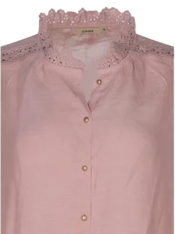Chemisier en coton rose uni avec des manches longues et une coupe droite