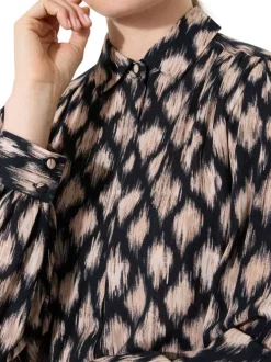 Chemisier noir et taupe avec un imprimé de losanges abstraits