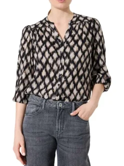 Chemisier noir et taupe avec un imprimé de losanges abstraits