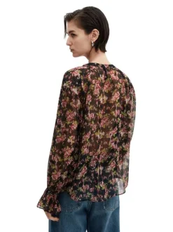 Chemisier noir fleuri avec une coupe droite et un col rond fendu à nouer