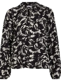 Chemisier noir imprimé abstrait avec une coupe loose fit et un col ruffle