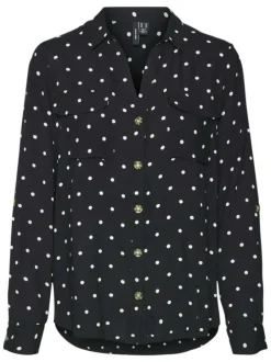 Chemisier noir à pois blancs avec une coupe droite fluide et un col à revers