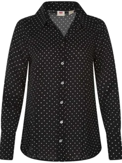 Chemisier noir transparent avec un imprimé à pois blancs et des manches longues