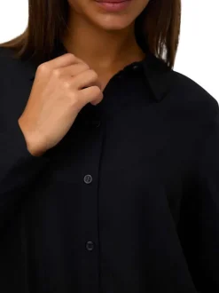 Chemisier noir uni avec un col chemise et des manches longues