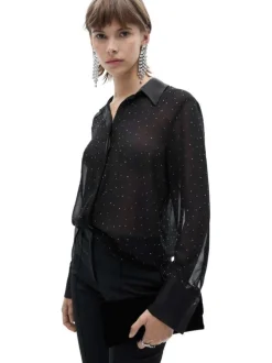 Chemisier noir uni avec une col français et une coupe droite à manches longues