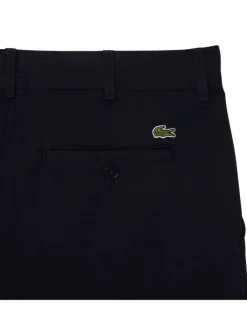 Chino en coton marine uni slim avec poches à l'italienne à l'avant