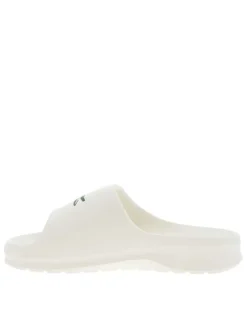 Claquettes blanc cassé avec logo de la marque floqué sur la bride