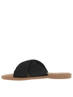Claquettes noires en tressage avec le logo doré et à semelle plate