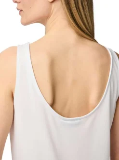 Débardeur blanc uni avec un décolleté rond à l'avant et au dos