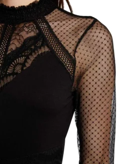 Débardeur écru uni avec une coupe ajustée et un décolleté arrondi