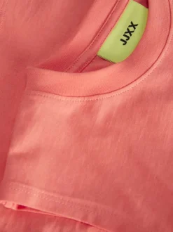 Débardeur en coton biologique orange avec coupe cropped et col rond