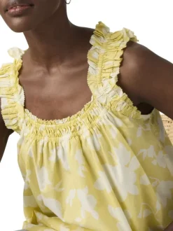 Débardeur en coton jaune floral avec une coupe ample et un col rond