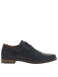 Derbies en cuir lisse bleu marine à talon décroché bas et à lacets ronds