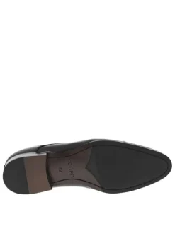 Derbies en cuir noires avec un talon décroché bas et des lacets ronds
