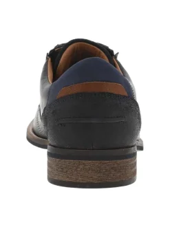 Derbies en cuir noires à talon plat avec fentes sur les côtés et lacets ronds