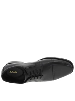 Derbies en cuir noir à talon décroché bas, chaussant ajusté par lacets ronds