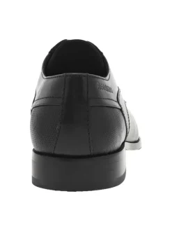 Derbies en cuir noir à talon décroché bas et à lacets ronds enduis