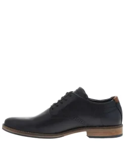 Derbies en cuir patiné marine à talon décroché bas et à lacets ronds enduis