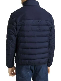Doudoune marine uni avec une coupe droite et des poches zippées