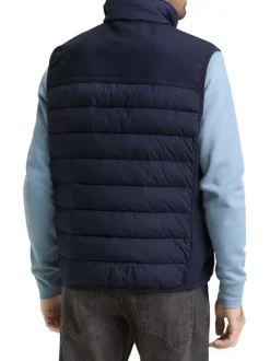 Doudoune marine uni avec une fermeture zippée et un col montant