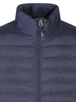Doudoune marine unie avec une coupe droite et un col montant zippé