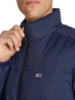 Doudoune marine unie droite à col montant zippé et logo sur la poitrine