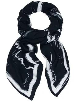 Foulard noir avec des imprimés blancs et un revêtement en maille tressée