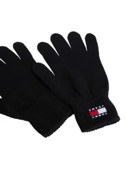 Gants en coton biologique noirs unis avec le logo de la marque cousu au poignet