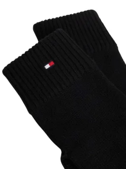 Gants noirs en coton et maille tricotée avec le logo de la marque