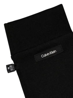 Gants noirs unis avec lien de serrage au niveau des poignets et nom iconique