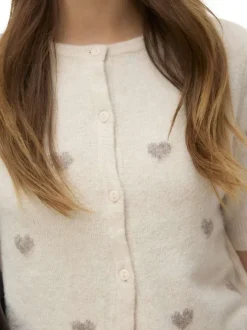 Gilet beige coupe droite pourvu d'un col rond et de manches 3/4