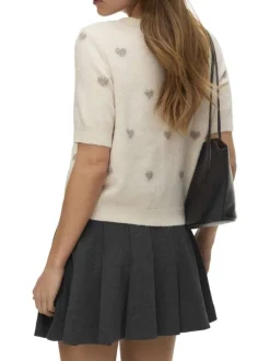Gilet beige coupe droite pourvu d'un col rond et de manches 3/4