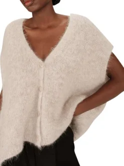 Gilet beige en maille tricotée avec une coupe ample et un col v