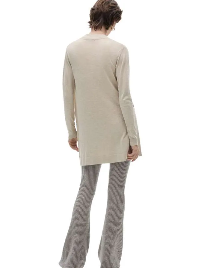 Gilet beige uni avec une coupe droite et des manches longues