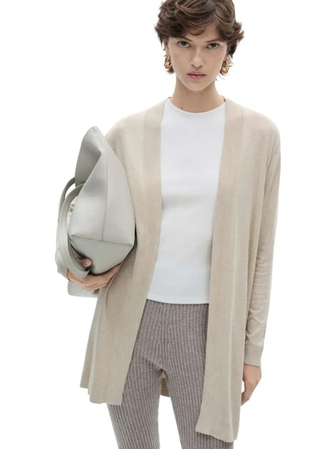 Gilet beige uni avec une coupe droite et des manches longues