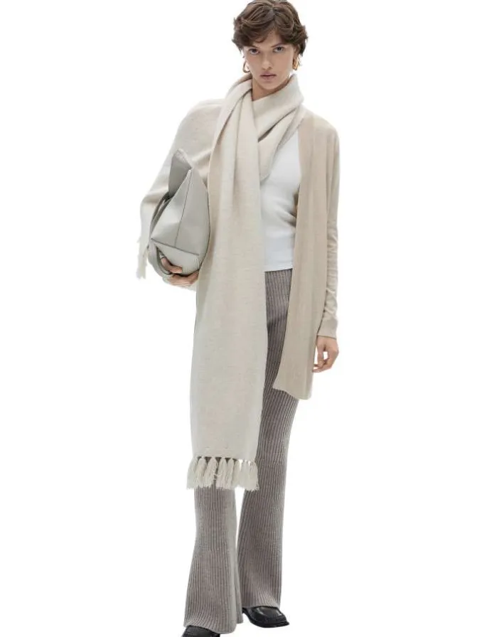 Gilet beige uni avec une coupe droite et des manches longues