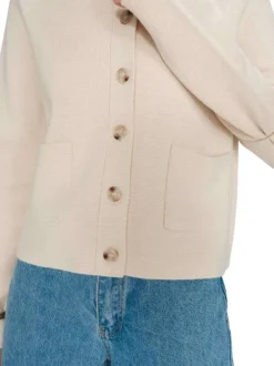 Gilet beige uni avec une coupe droite et des manches longues
