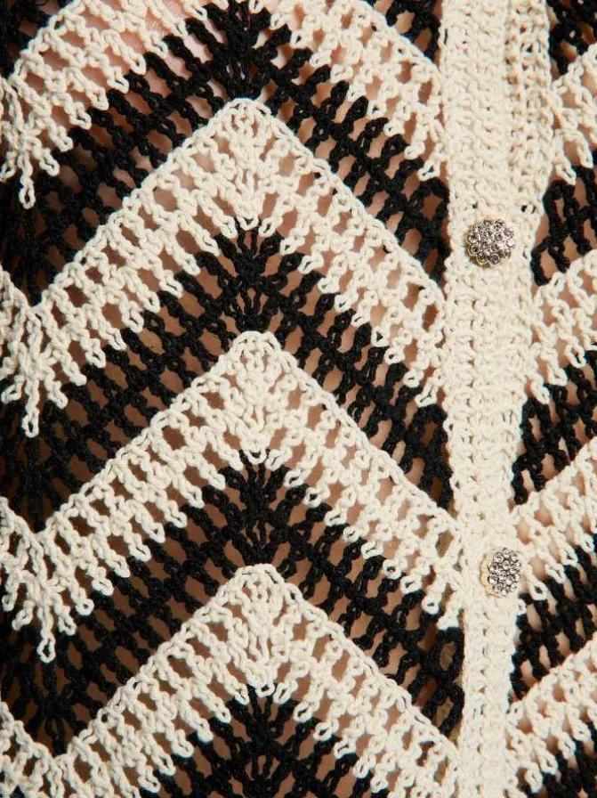Gilet black à rayures pourvu d'une coupe droite et d'un col en V