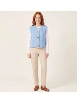 Gilet ciel uni à coupe droite avec des boutons métalliques dorés et un col rond