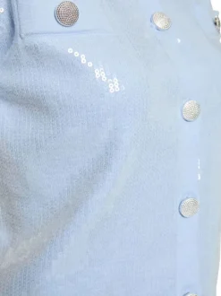 Gilet ciel uni pourvu d’une coupe droite et d’un col rond
