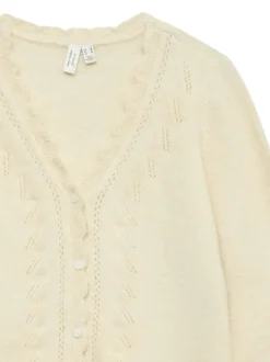 Gilet écru uni avec un col v et boutonnière nacrée à l'avant