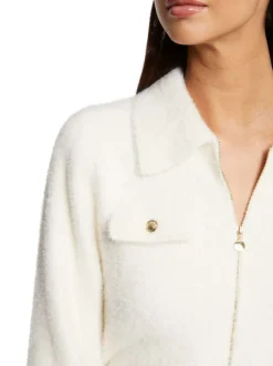 Gilet écru uni à coupe droite avec des manches longues et zip doré
