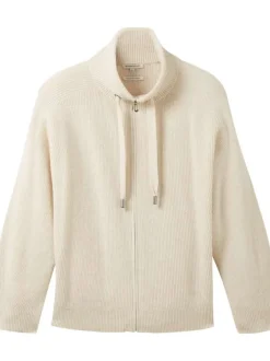 Gilet écru uni coupe droite avec un col montant et des manches longues