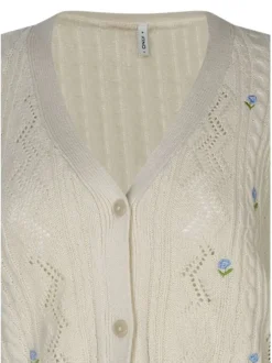 Gilet en coton mélangé écru uni pourvu de fleurs brodées et d'un col v
